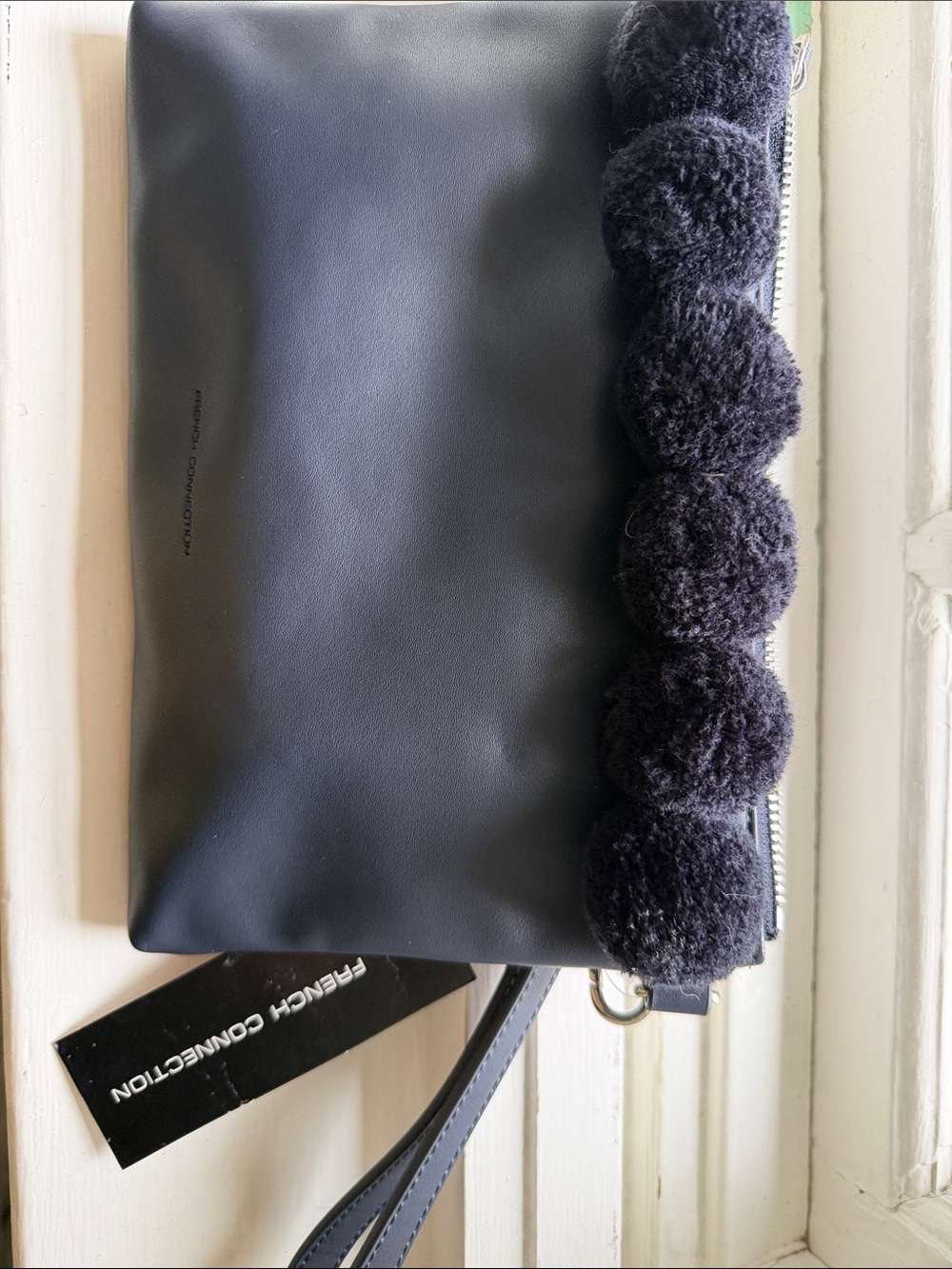 French Connection Black Pom Pom-Trim Wristlet